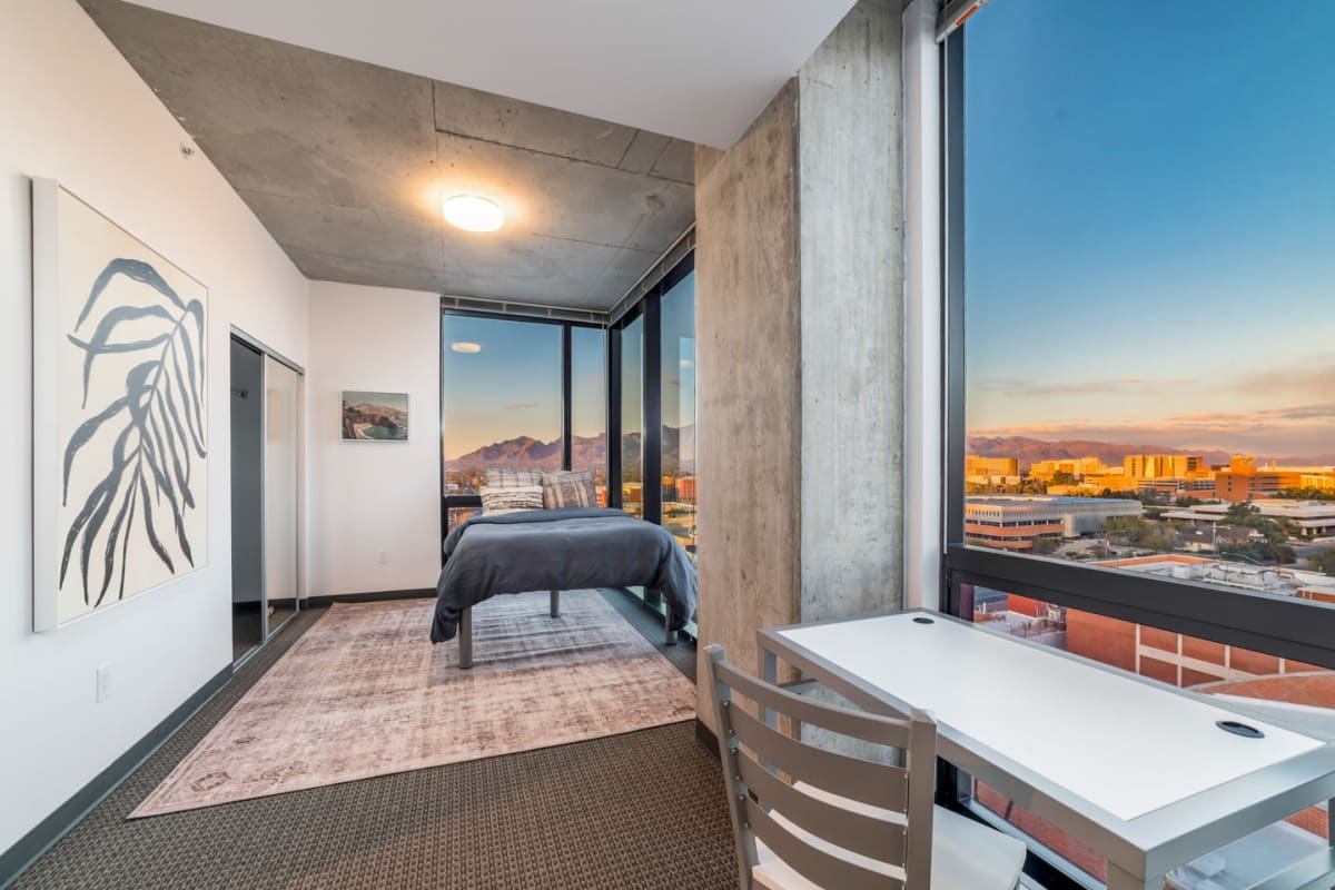 Model bedroom with huge windows at The Pacific and Malibu in Tucson, Arizona