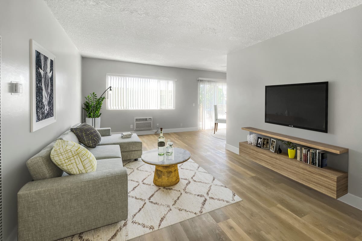 Living room with rug and wood-style flooring at The Summit at La Crescenta in La Crescenta-Montrose, California