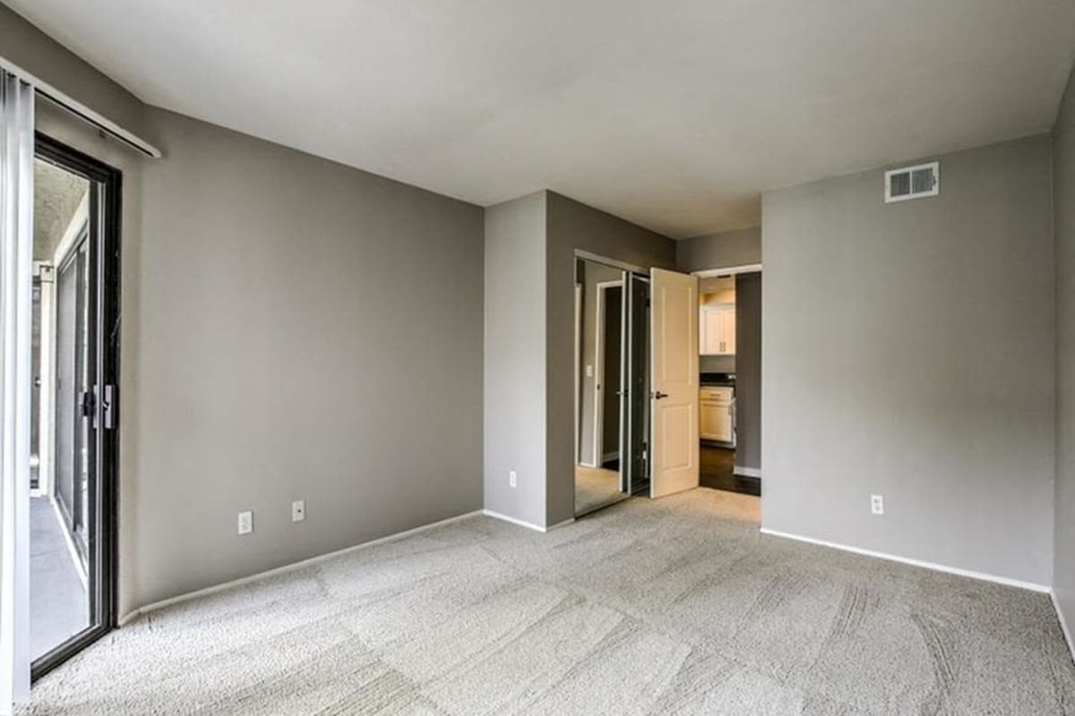 Empty bedroom with ample natural light at Flower Fields in Carlsbad, California