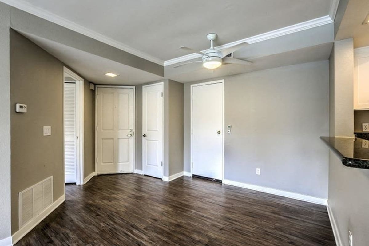 Living room with wood-style flooring at Flower Fields in Carlsbad, California