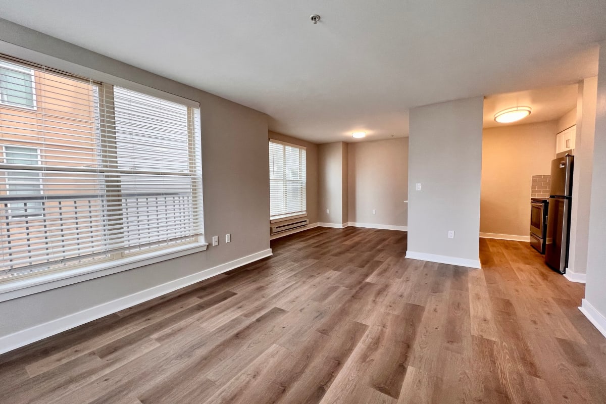 Studio type with wide windows and fridge at Vantage Park Apartments in Seattle, Washington