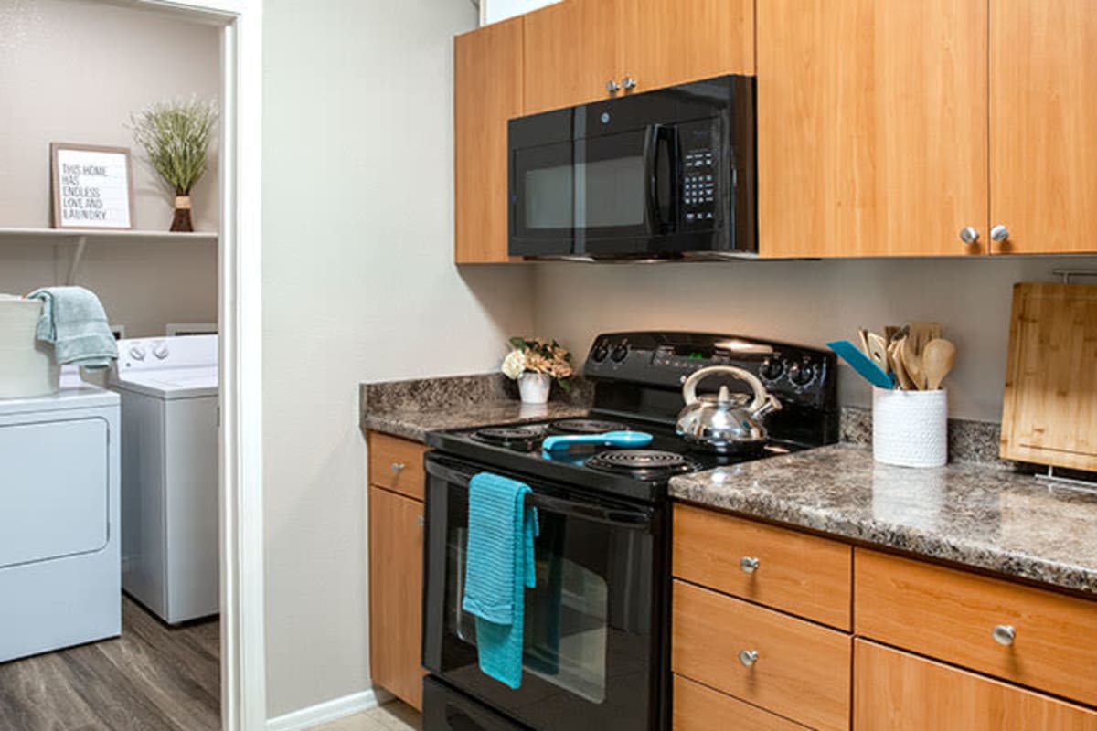 Kitchen with modern appliances at Ascent at Papago Park in Phoenix, Arizona