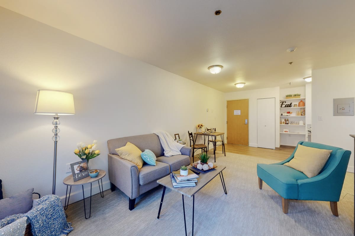 Senior living apartment living room at Northgate Plaza in Seattle, Washington