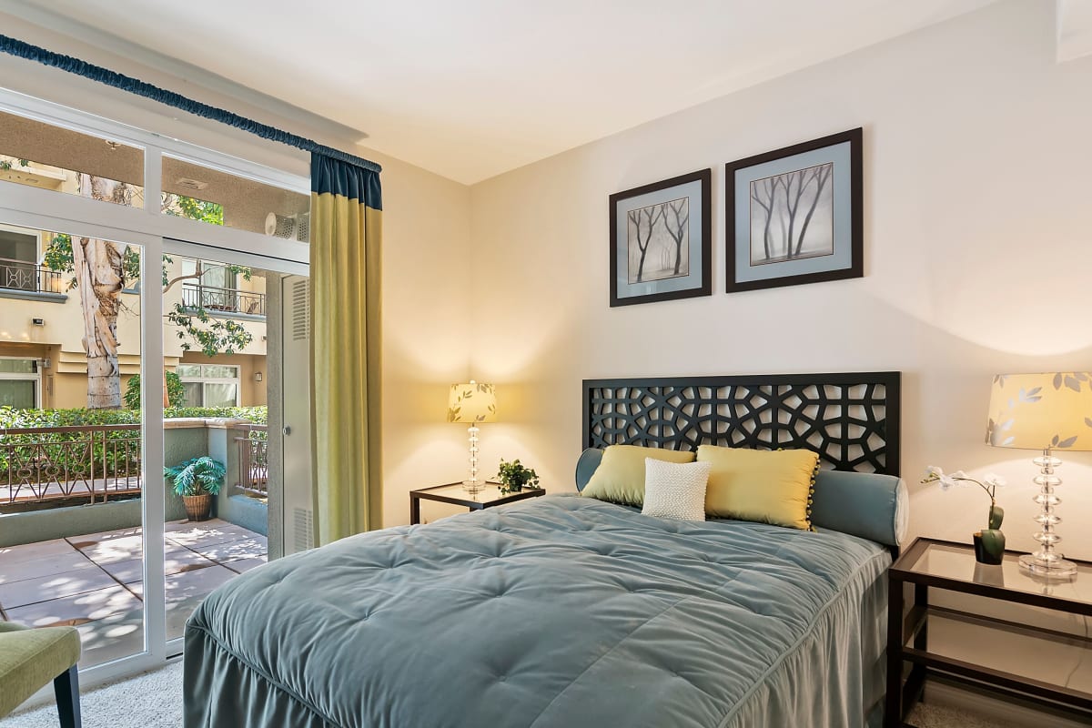 Model bedroom with large window at Playa Del Oro, Los Angeles, California