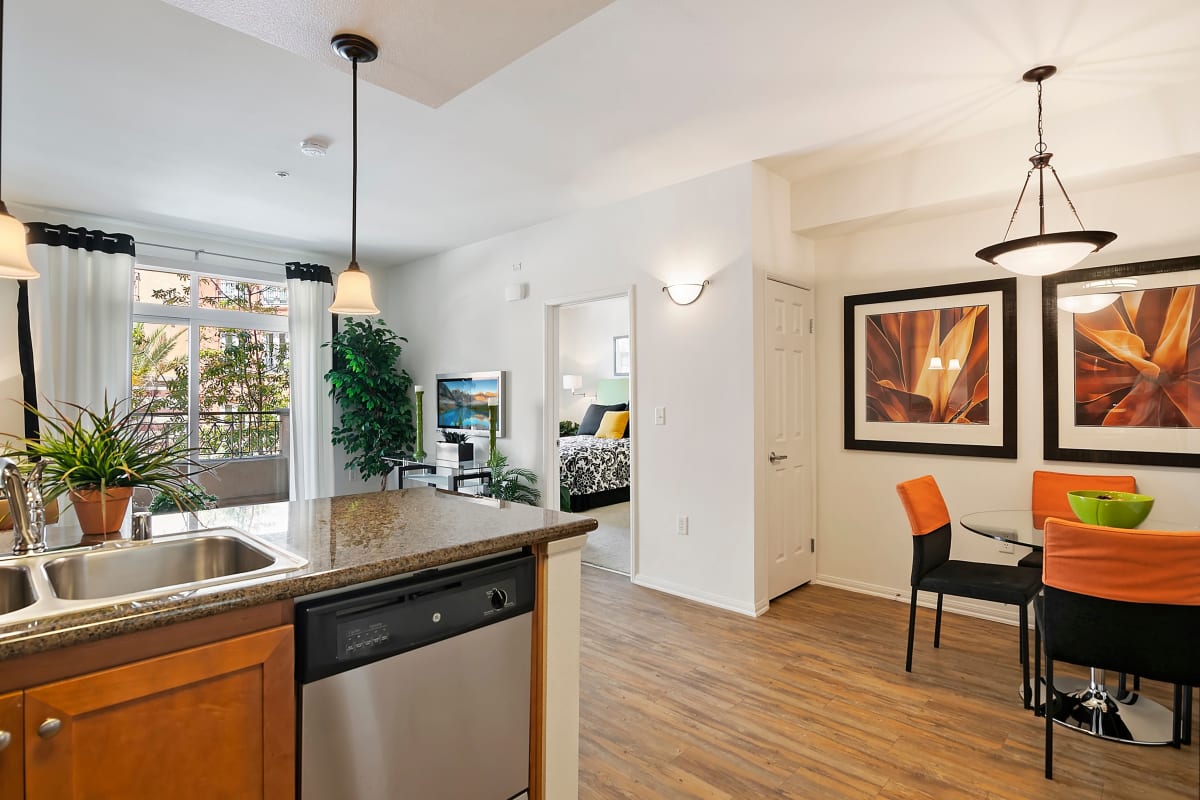 Stylish kitchen with wood-style flooring at Playa Del Oro, Los Angeles, California