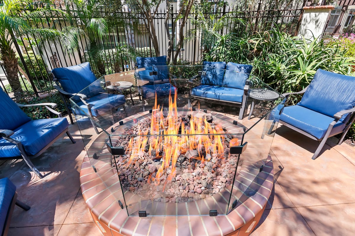 Outdoor firepit with chairs at Playa Del Oro, Los Angeles, California