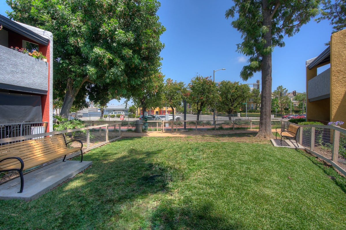 Dog park with bench at Reserve at South Coast in Santa Ana, California