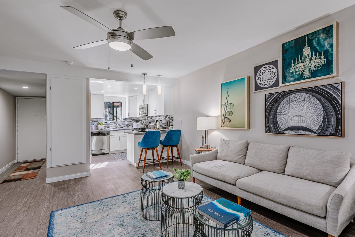 Model living space showing kitchen at Reserve at South Coast in Santa Ana, California