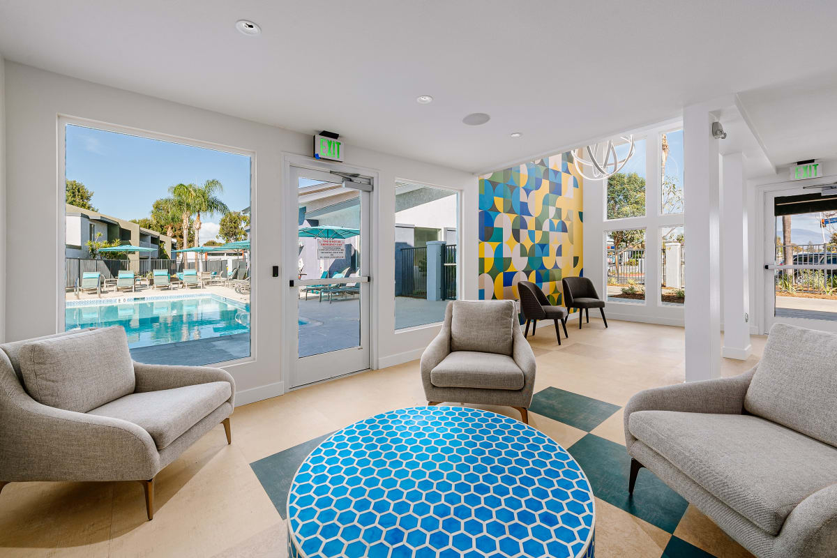 Gathering space with blue accents at Reserve at South Coast in Santa Ana, California