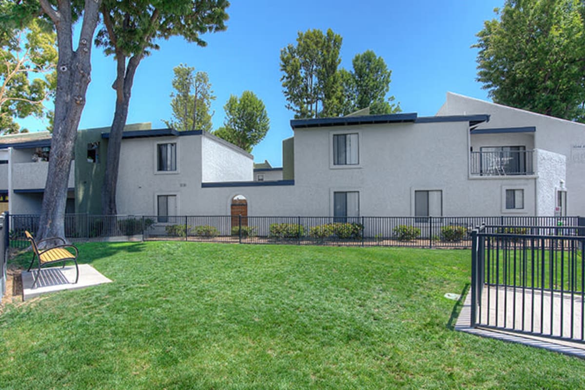 Dog park showing building at Reserve at South Coast in Santa Ana, California