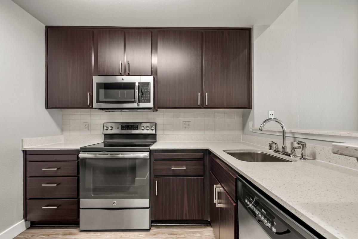 Modern kitchen with wood accents at The Bridge at Emeryville in Emeryville, California