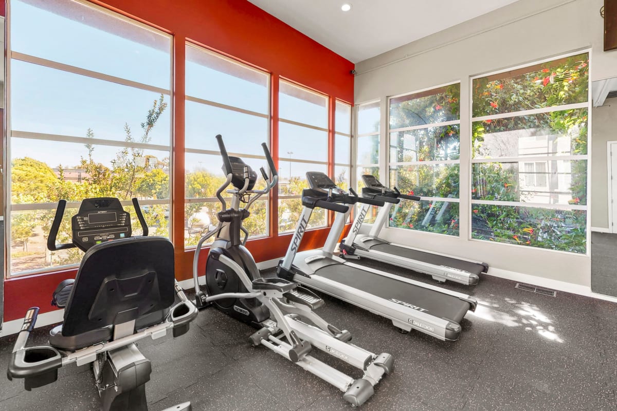 Fitness center with red accents at The Bridge at Emeryville in Emeryville, California