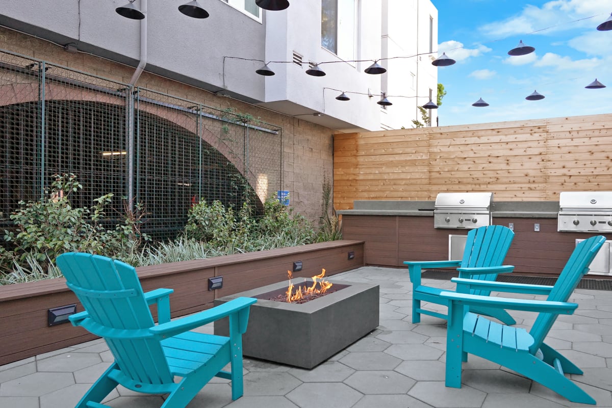 Exterior seating area with fireplace at The Bridge at Emeryville in Emeryville, California