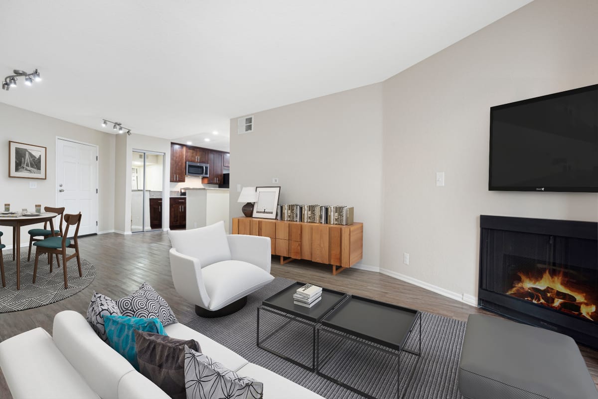 Model living space with fireplace at The Jeremy in Los Angeles, California