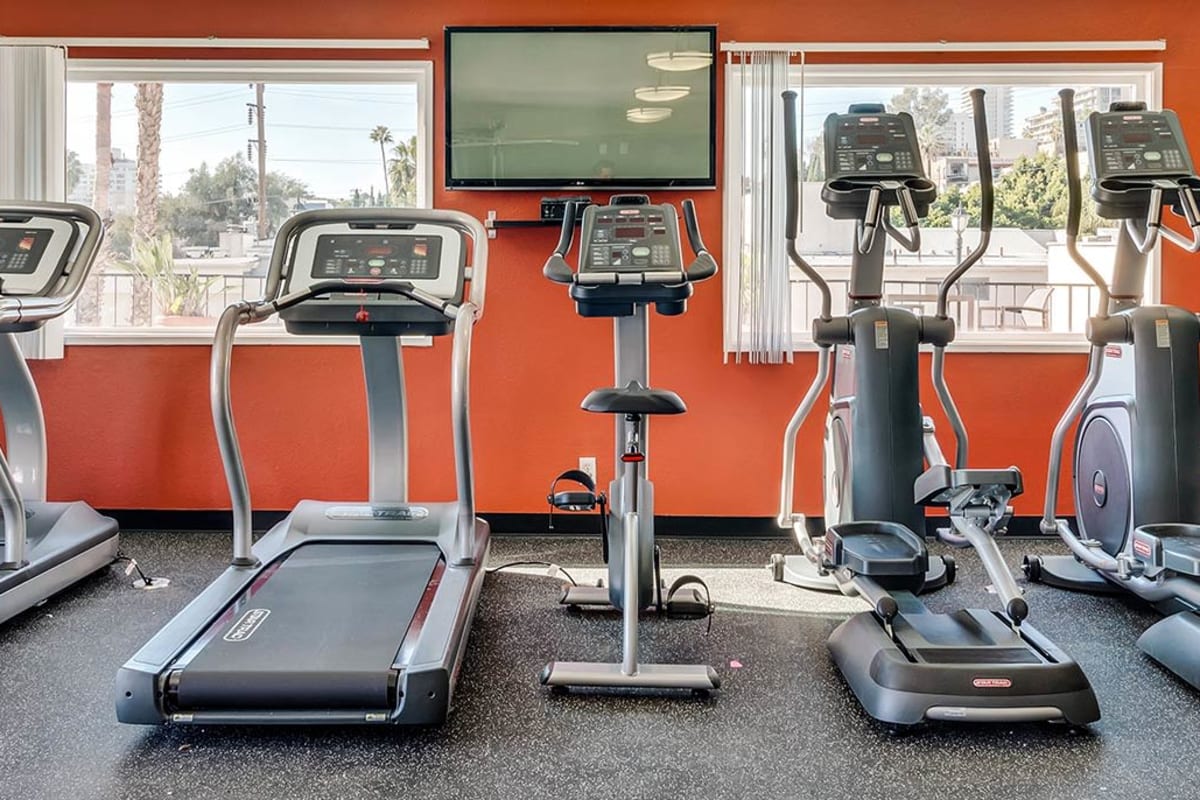 Community gym with treadmills at Villa Francisca in West Hollywood, California