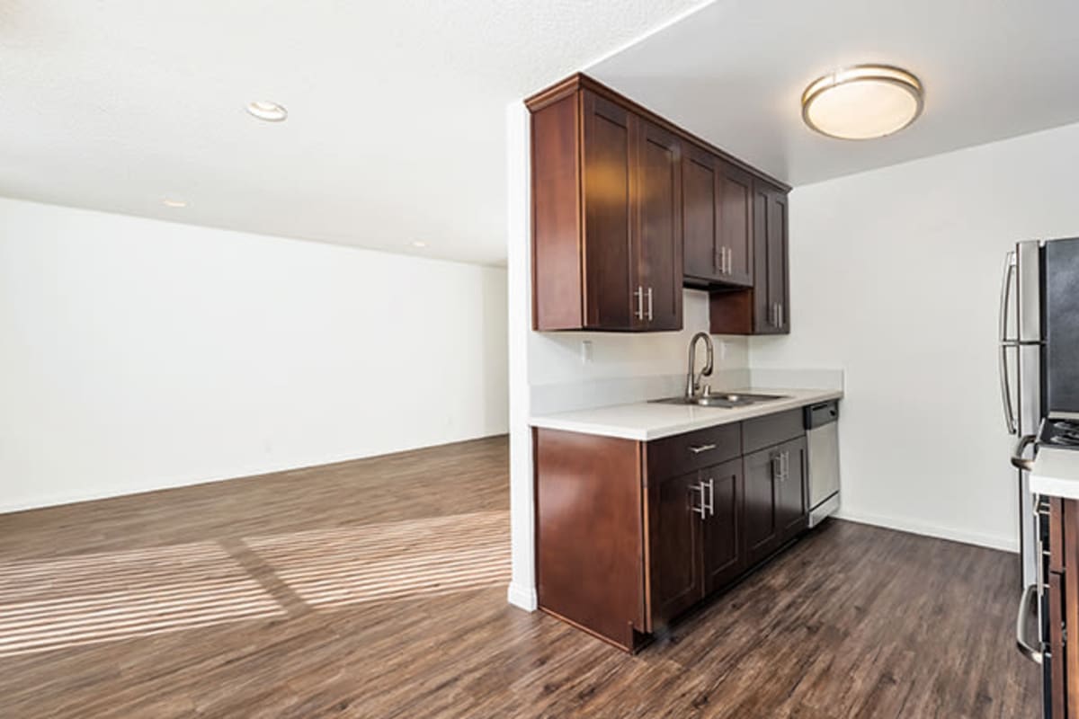 Model living space with hardwood floors at Villa Francisca in West Hollywood, California