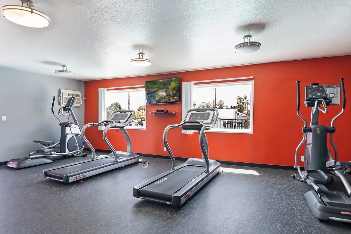 Resident gym with treadmills at Villa Francisca in West Hollywood, California