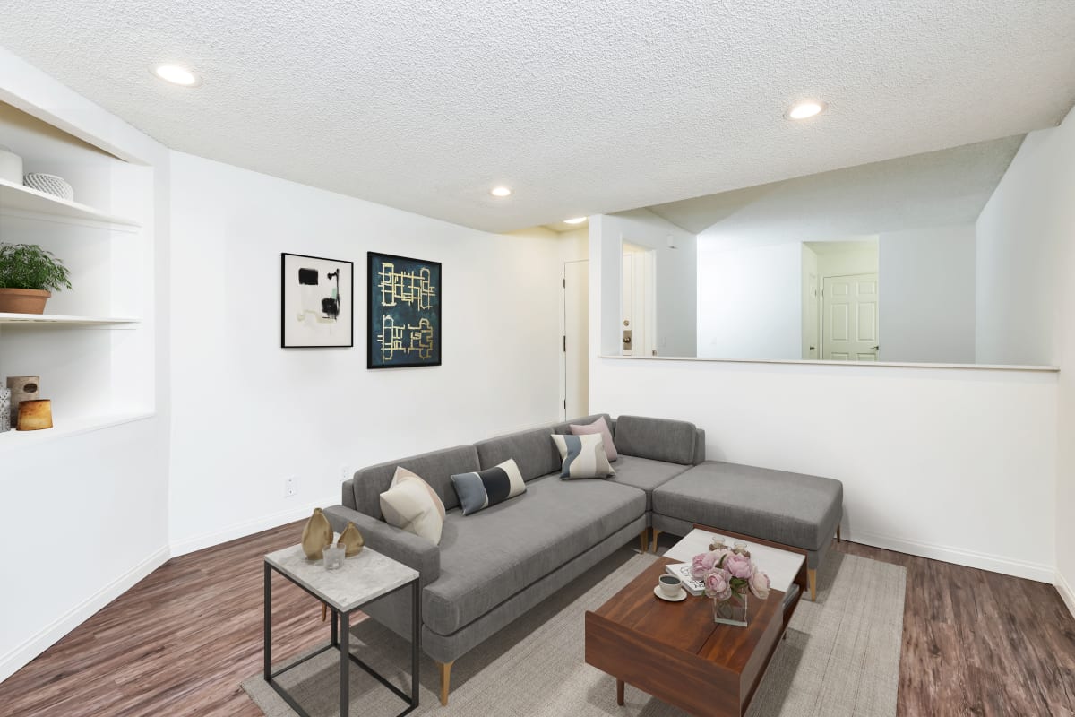 Model living room with white walls at Villa Francisca in West Hollywood, California