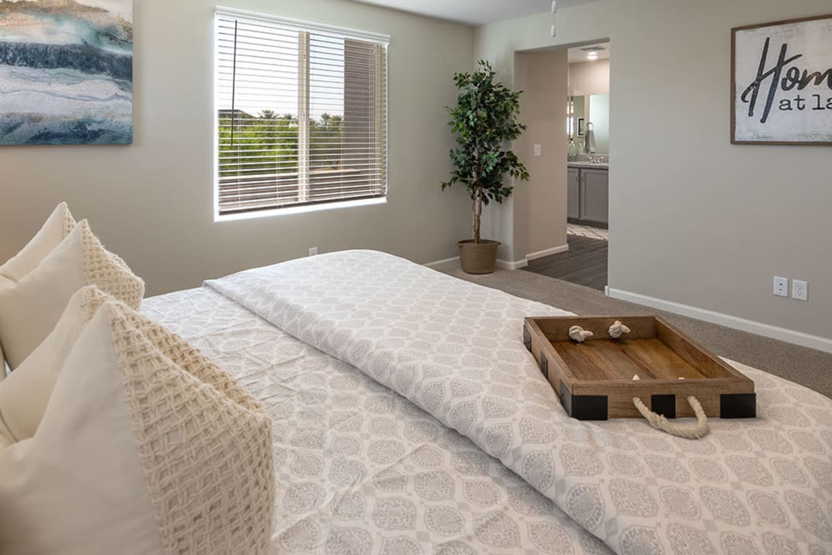 Light-filled bedroom at The Reserve at Eastmark in Mesa, Arizona