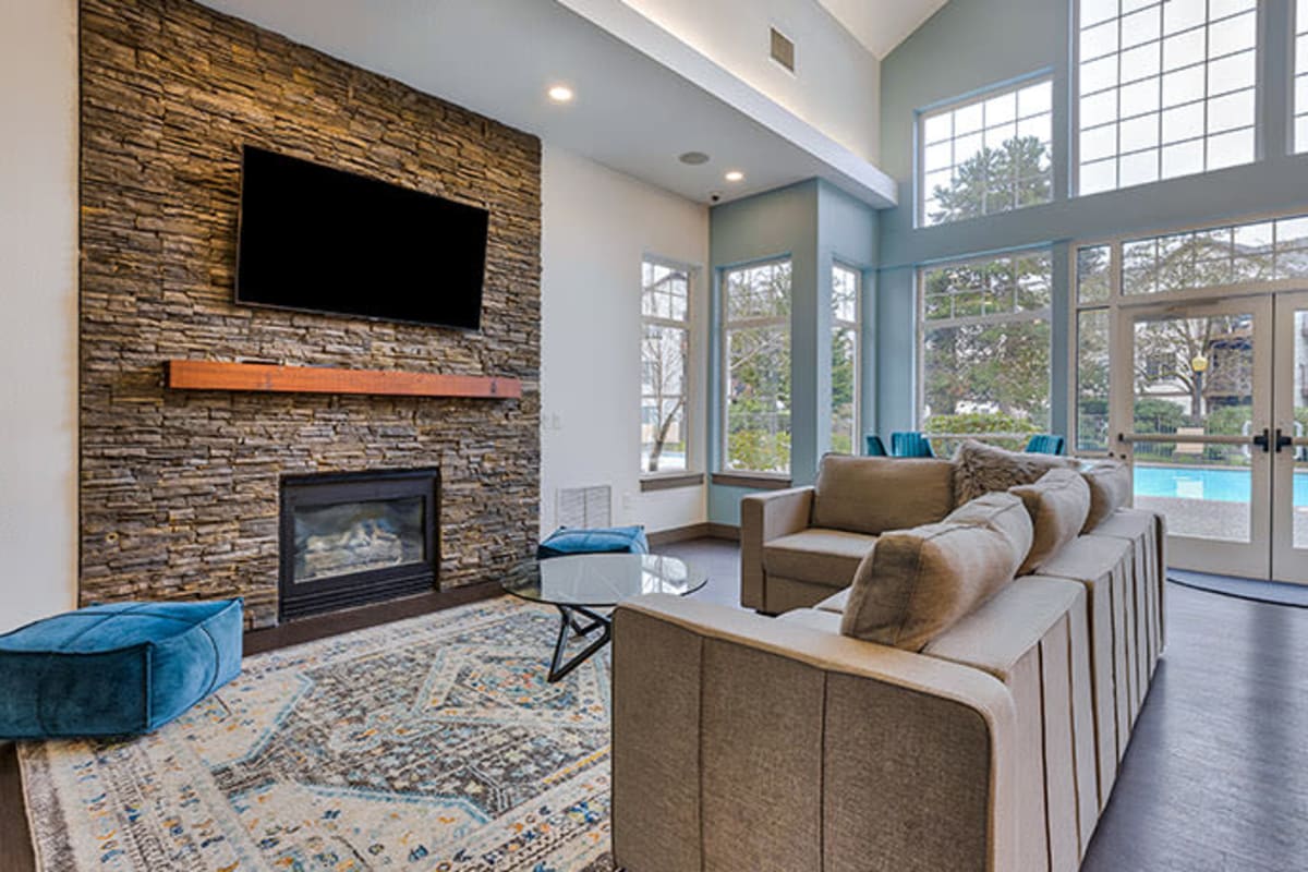 Clubhouse lounge with fireplace at The Retreat at Bothell in Bothell, Washington