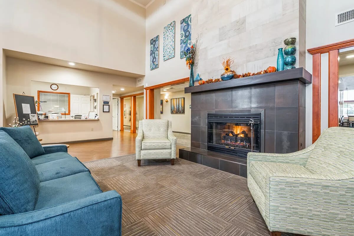 Community area with fireplace at Trustwell Living at Ridgeview Place in Spokane Valley, Washington
