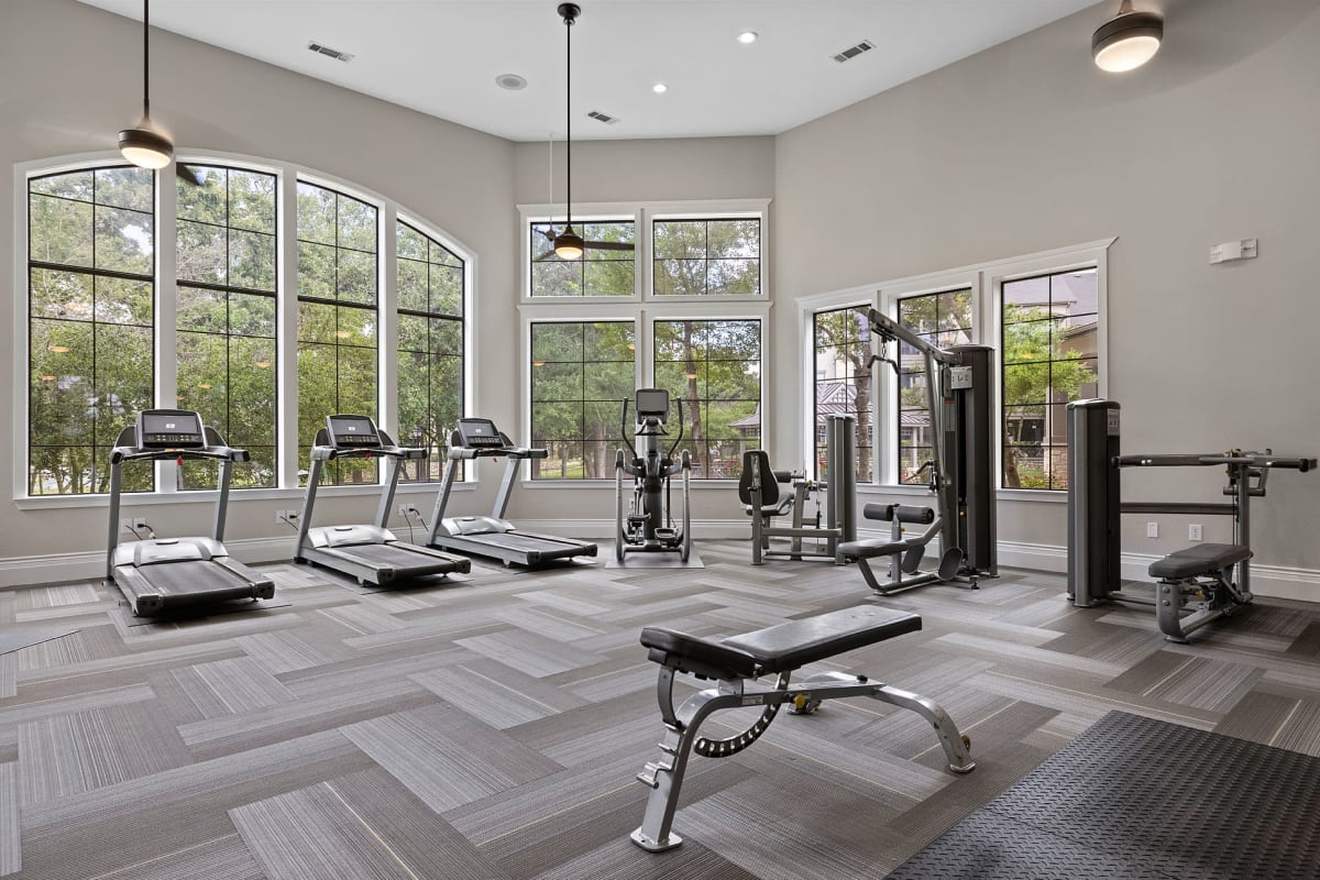 Spacious fitness center with fans at The Marquis at Brushy Creek in Austin, Texas