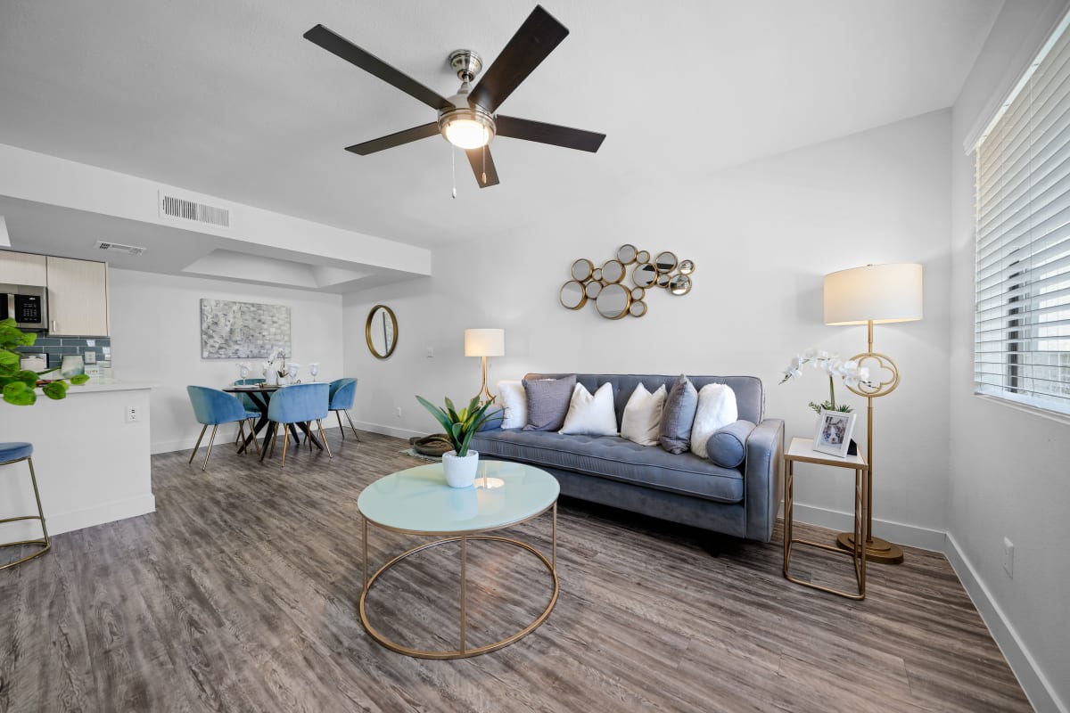Living room with ceiling fan at Park at 33rd in Phoenix, Arizona