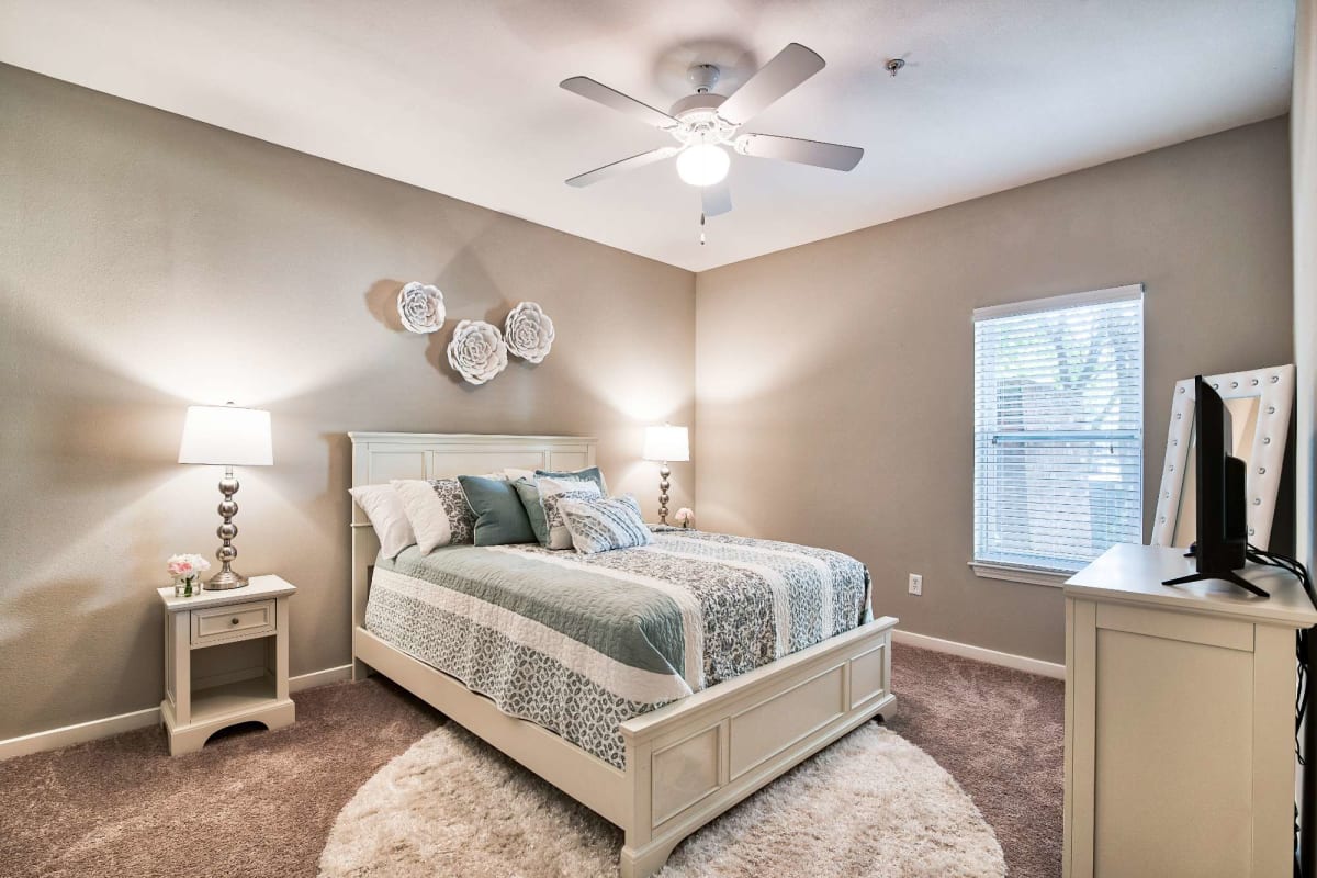 Bedroom with ceiling fan at Cypress Lake in Baton Rouge, Louisiana