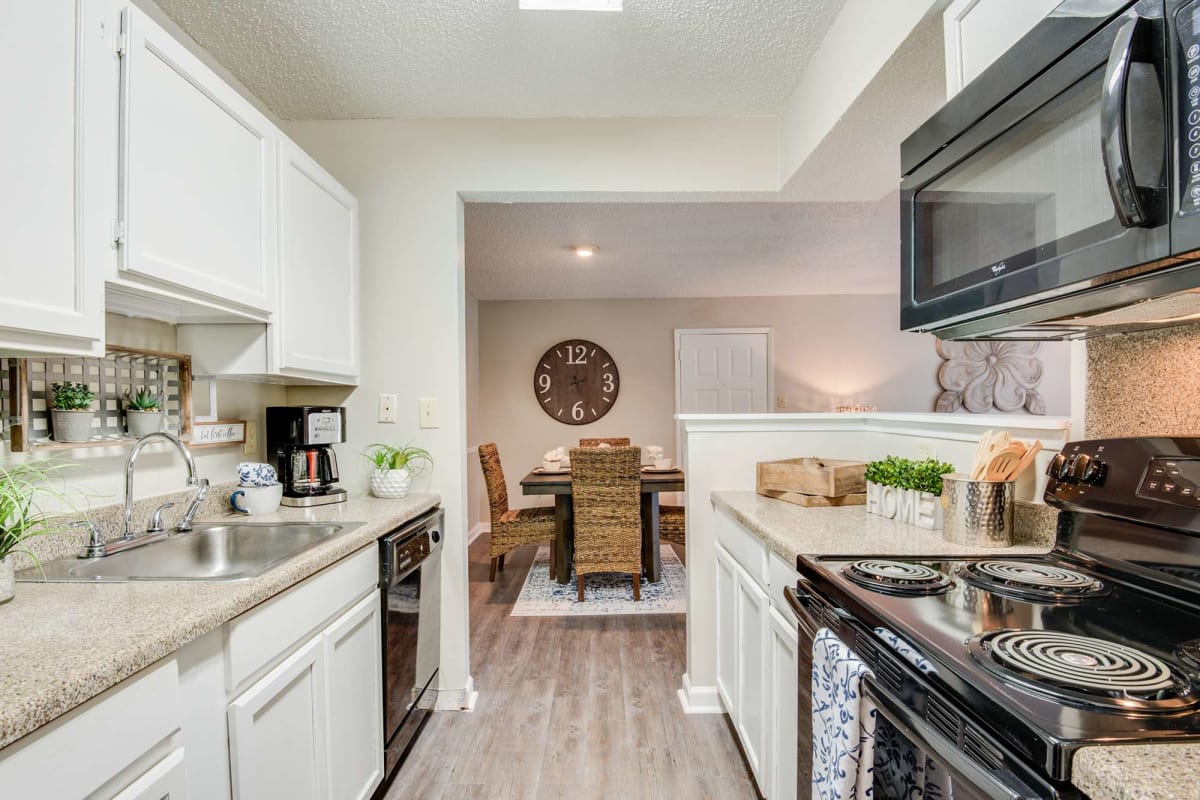 Modern kitchen with ample counter space at Oakleigh Apartments in Baton Rouge, Louisiana
