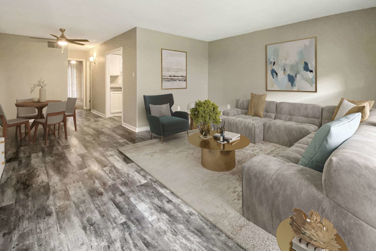 Resident living room with cozy sofa at Tiger Pointe in Baton Rouge, Louisiana