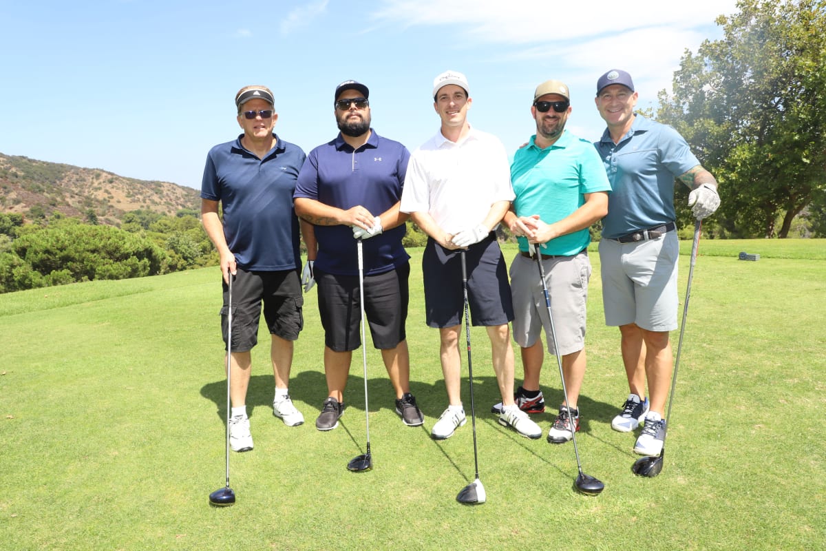 Team mates golfing for charity Decron Properties, Los Angeles, California