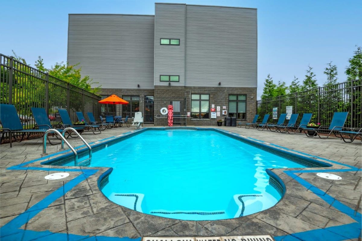 Outdoor swimming pool at Park West 205 Apartment Homes in Pittsburgh, Pennsylvania
