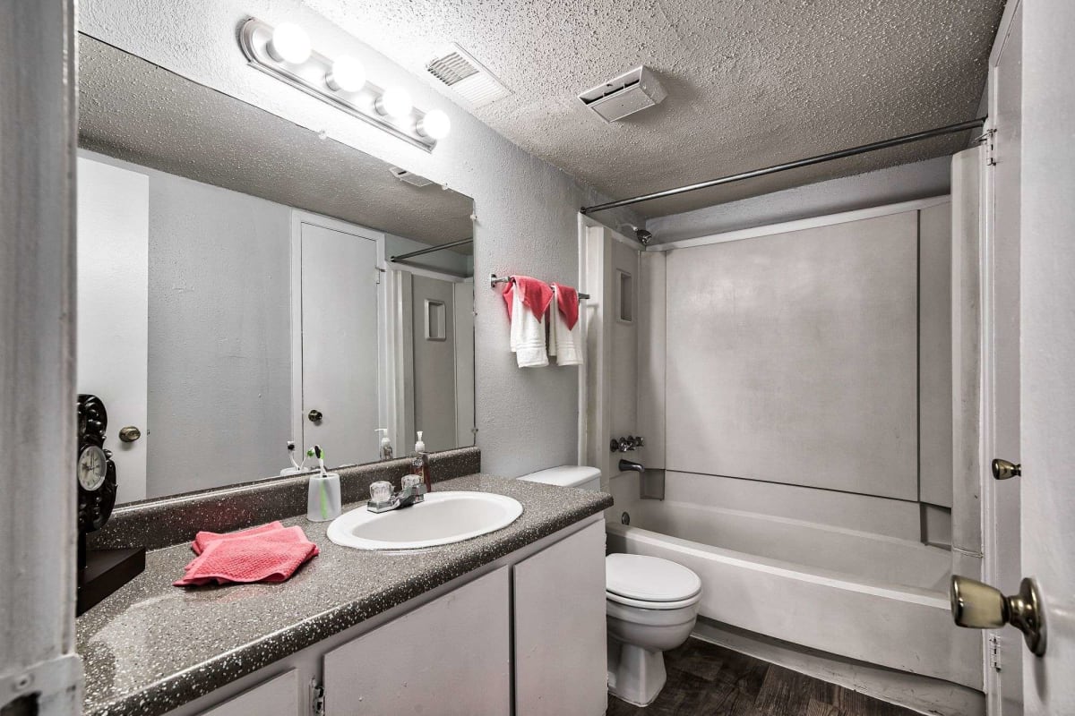 Resident bathroom with great lighting at Sherwood Acres in Baton Rouge, Louisiana