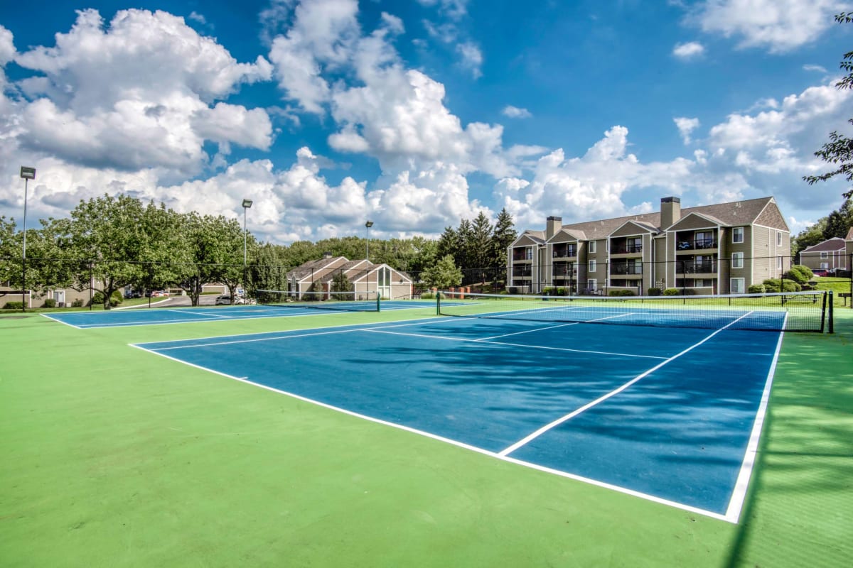 On-site tennis courts at Aspen Lodge in Overland Park, Kansas