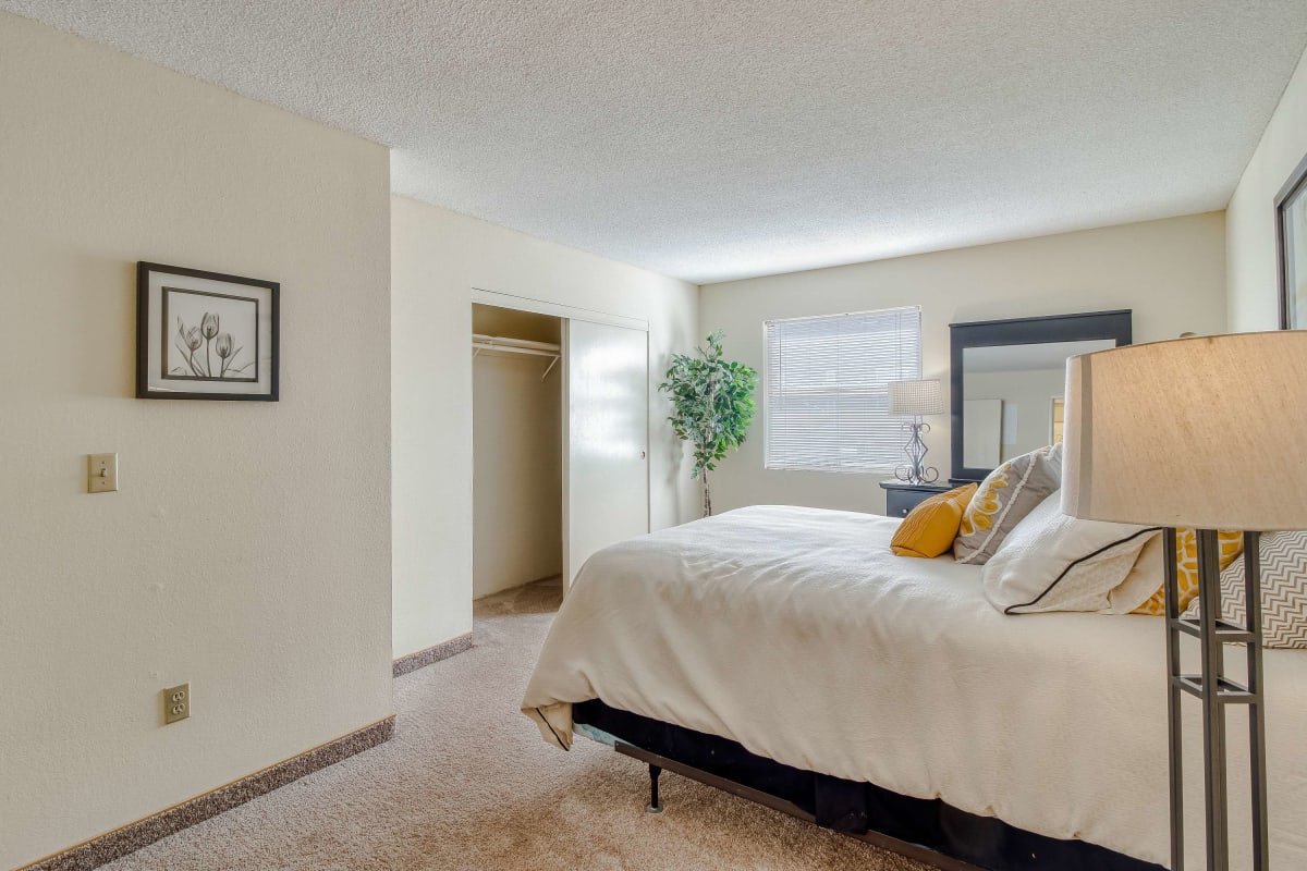 Bedroom with plush carpeting at Cypress Pointe in Louisville, Kentucky