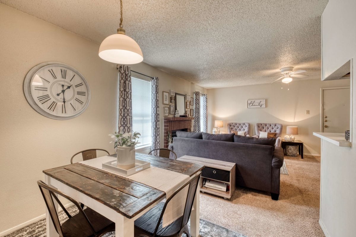 Resident living space with a ceiling fan at Hunters Glen in Killeen, Texas