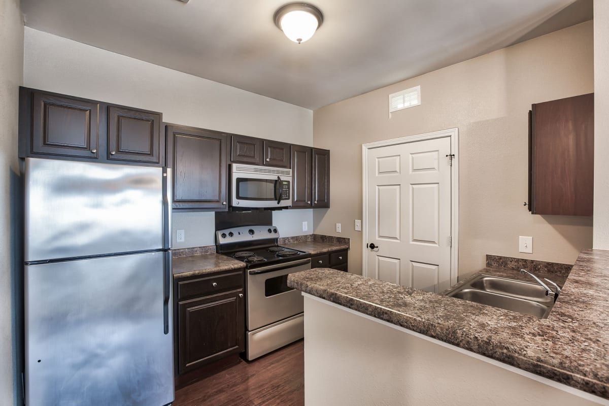 Resident kitchen with modern appliances at Renaissance at Peacher's Mill in Clarksville, Tennessee