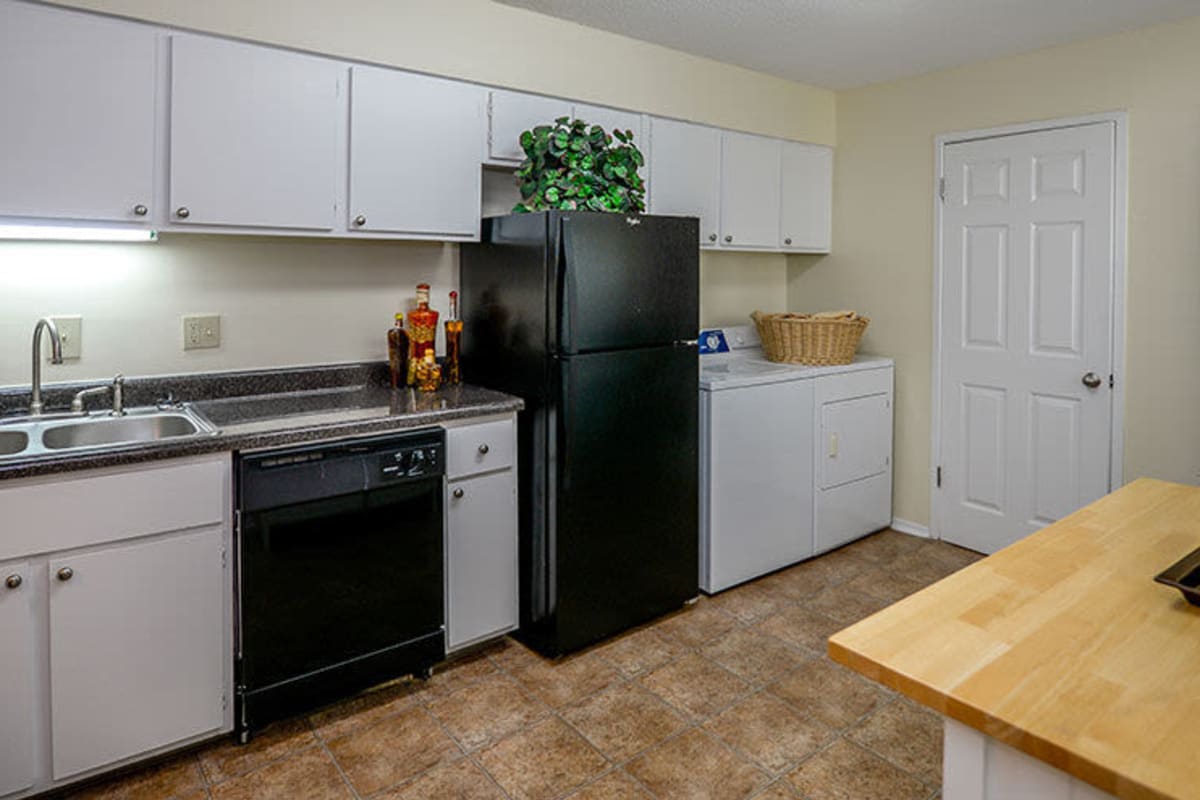 Resident kitchen with a dishwasher at Legacy on Lynnfield in Memphis, Tennessee