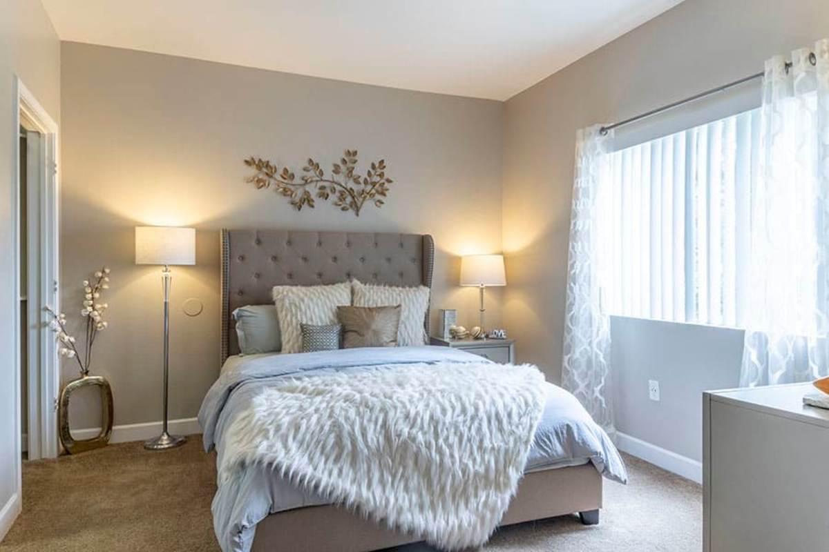 Well-lit bedroom at Villas at D'Andrea Apartment Homes in Sparks, Nevada