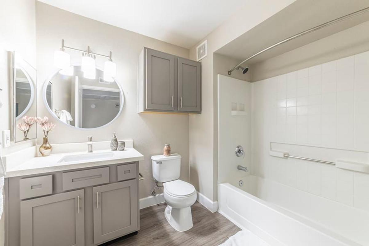 Bathroom with wood-style flooring at Villas at D'Andrea Apartment Homes in Sparks, Nevada