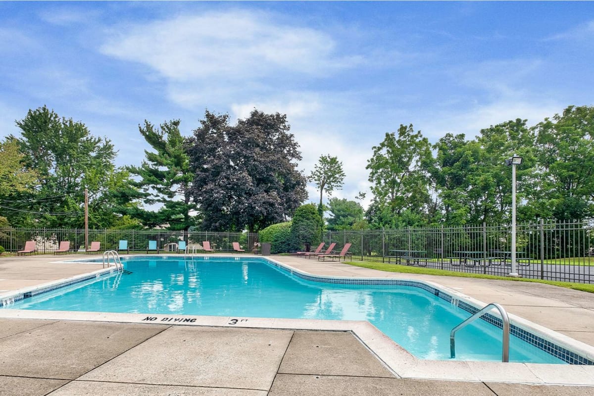 Community pool with lounge seating at Cloister Gardens in Ephrata, Pennsylvania