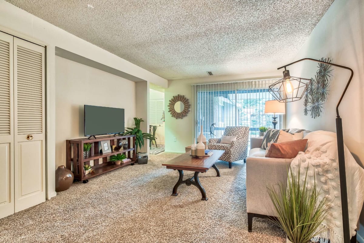 Resident living space with plush carpeting at The Pines in Harrisburg, Pennsylvania