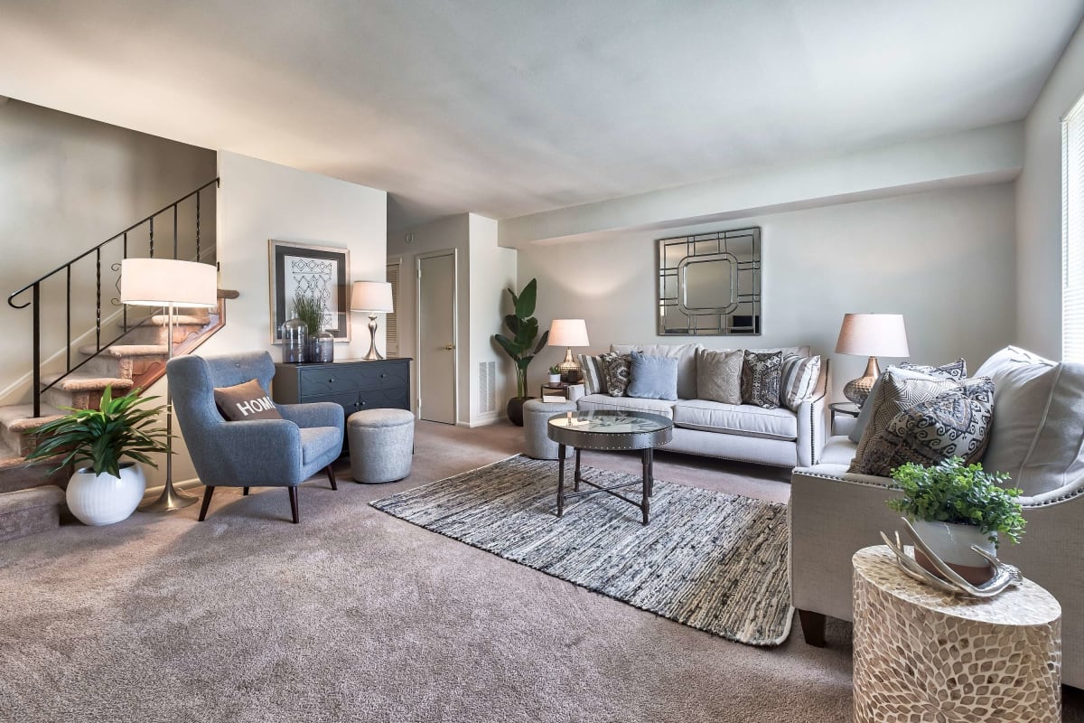 Spacious living space with plush carpeting at Wilkeswood in Wilkes Barre, Pennsylvania