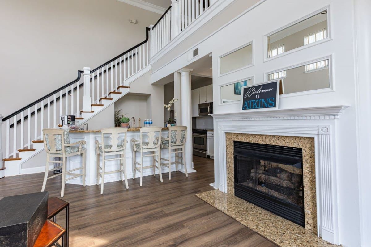 Fireplace and hightop table at Atkins Circle Apartments and Townhomes
