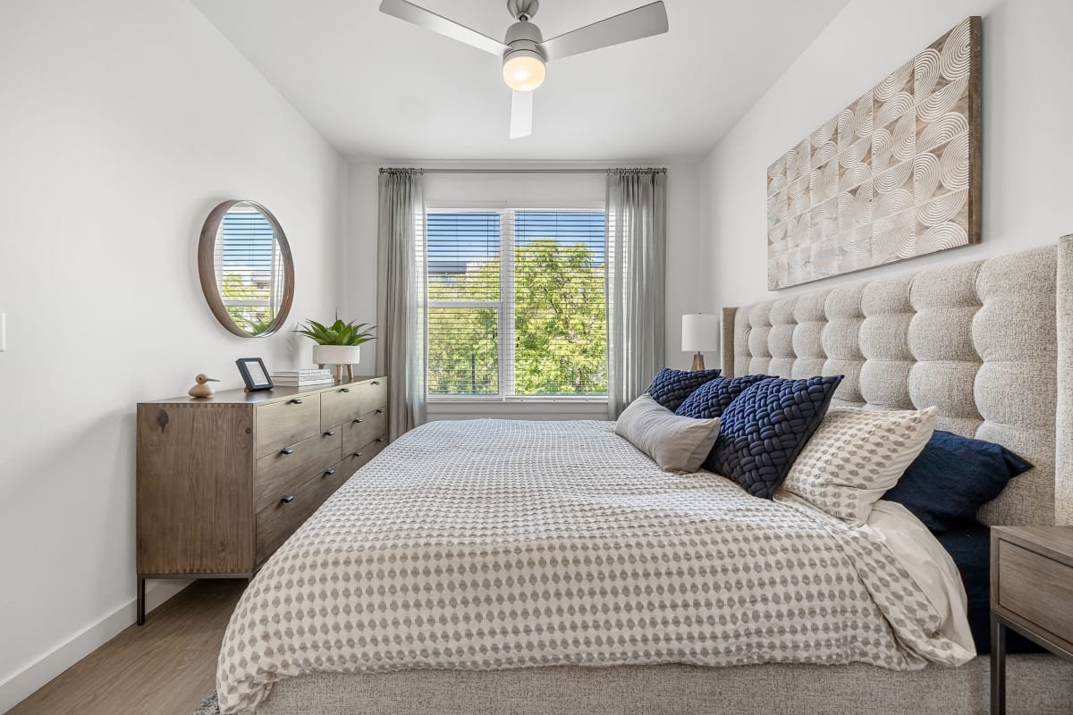 Spacious model bedroom with open natural lighting at 44 South in Austin, Texas