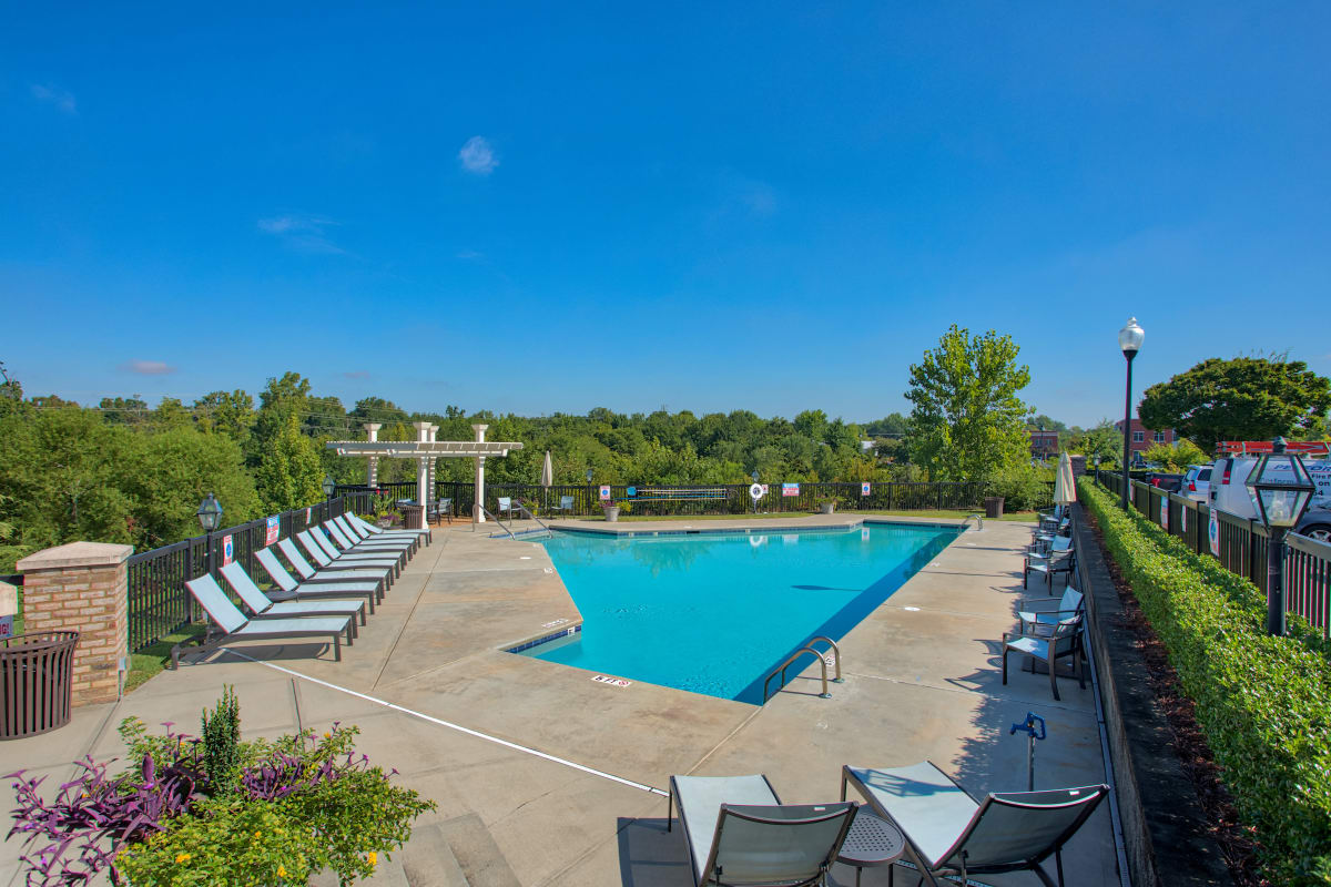 Exterior pool view of Atkins Circle Apartments & Townhomes Apartments in Charlotte, North Carolina