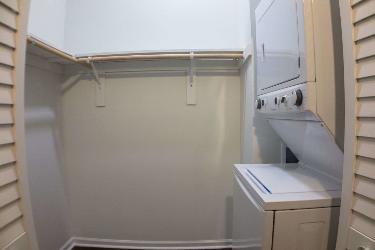 Large closet with a washer and dryer at The Maynard at Elaine Place in Chicago, Illinois