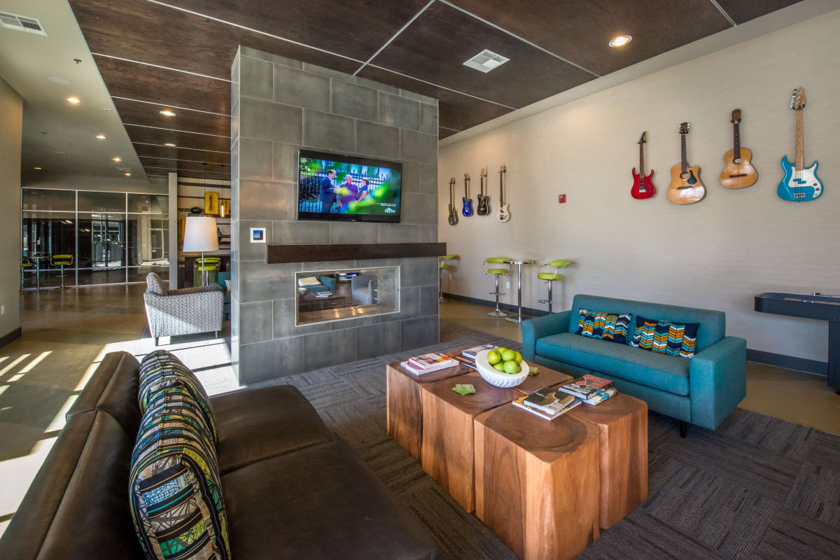 Lounge area in the clubhouse with TV at 33 North in Denton, Texas
