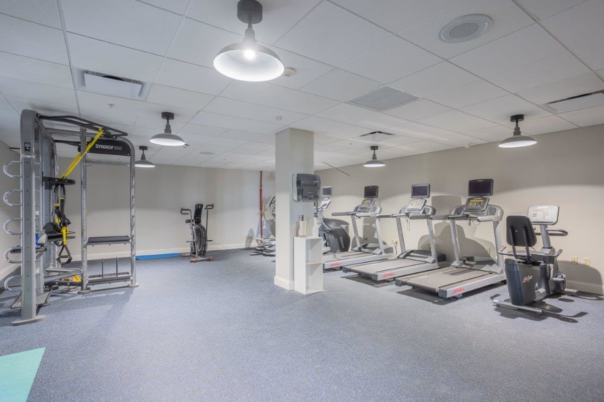 Fully equipped fitness center at Greenwood Cove Apartments in Rochester, New York