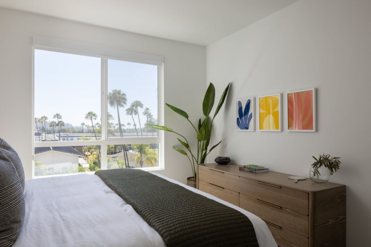 Modern bedroom with wall art at Margo at the Society in San Diego, California